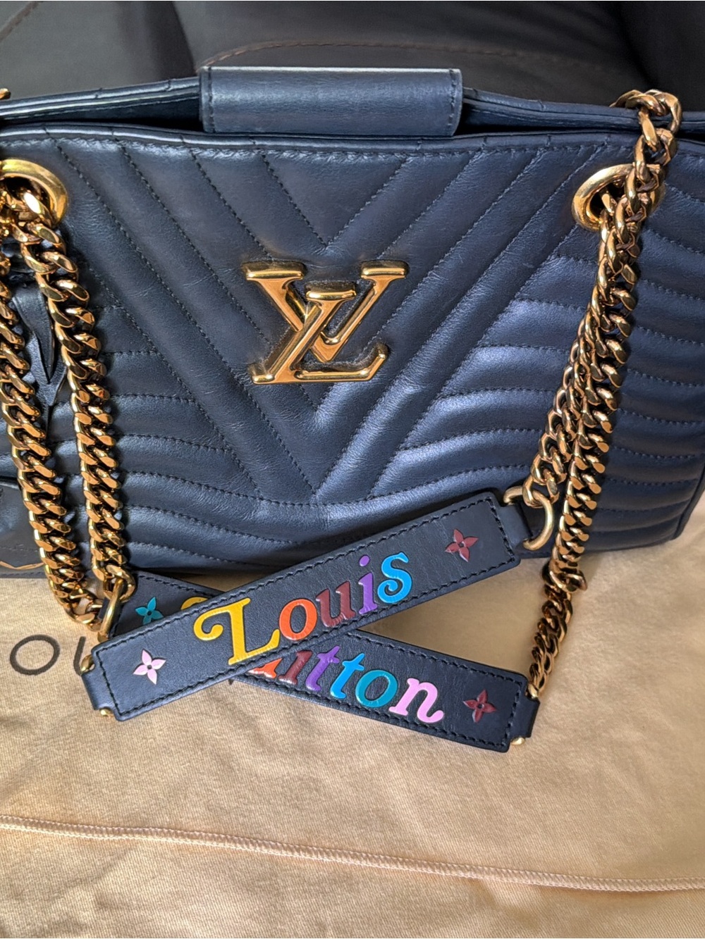 Louis Vuitton black Quilted Shoulder Bag with Gold Hardware and Multicolor Strap